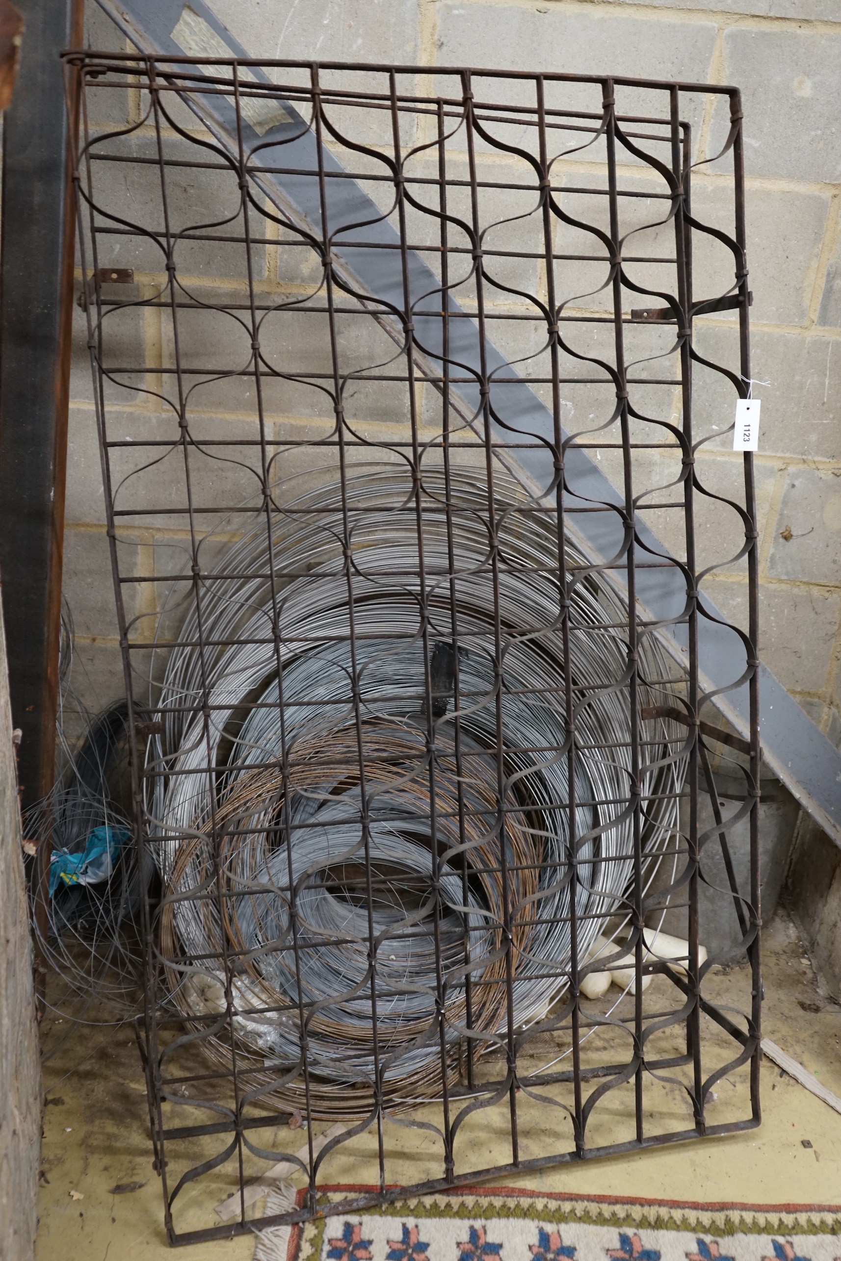 A French wrought iron 144 bottle wine cage, width 87cm, height 150cm
